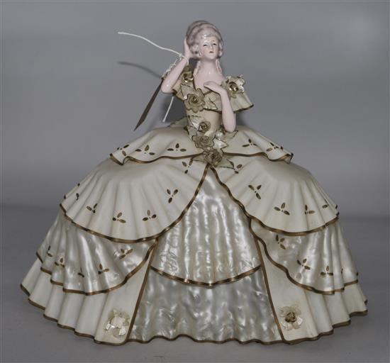 A crinoline lady lamp